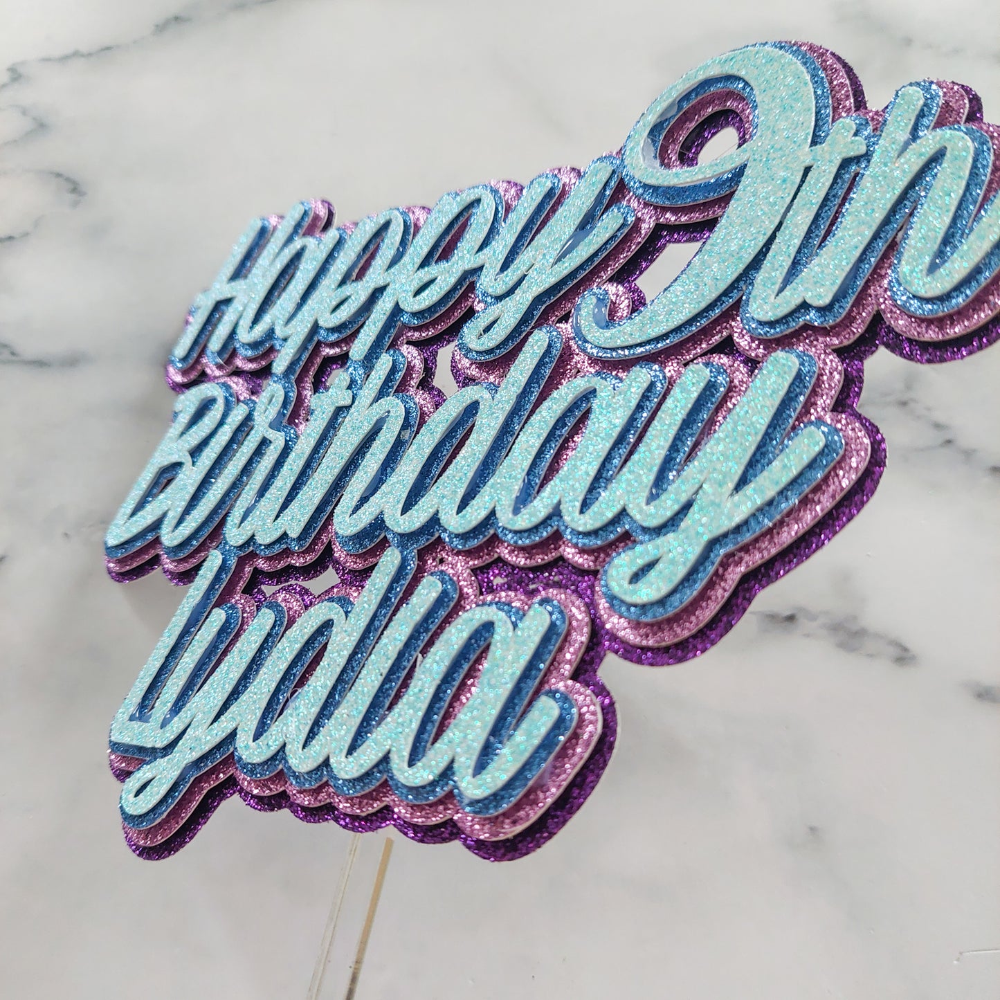 Blue and purple 3D layered glitter card cake topper