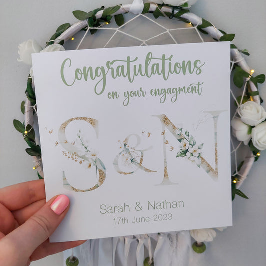 Sage green initial engagement card